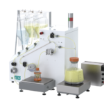 3/4 view of the Precision Tangential Flow Filtration (TFF) Unit featuring valves, pumps, TMP box, and tubing size knob for Transmembrane Pressure control.