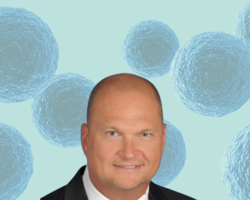 todd upton on a light blue background with large cells