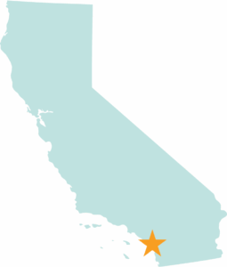 map of California in teal with star at the lower left side