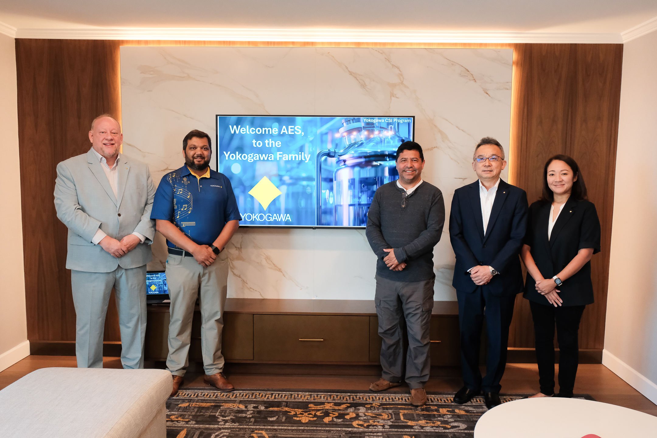 AES and Yokogawa teams at the signing ceremony